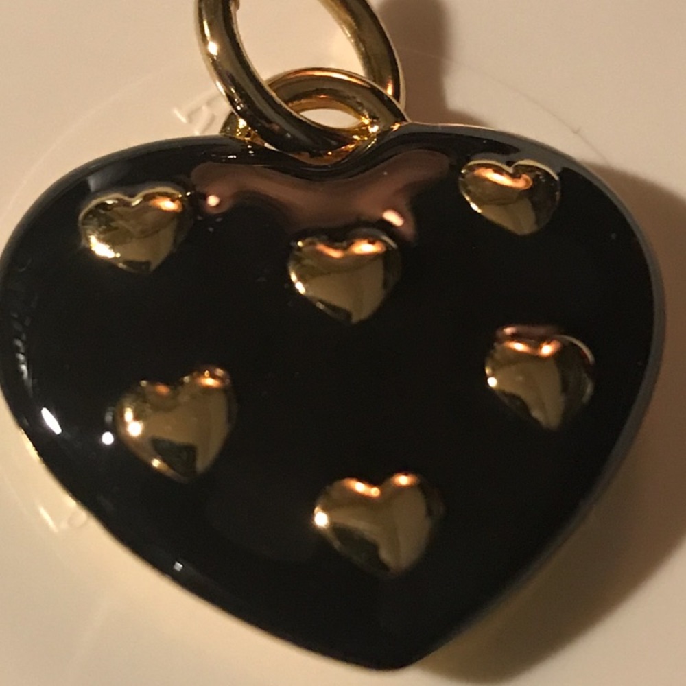 Black Heart Pendant with Small Gold Hearts on the Front. Gold on the Back